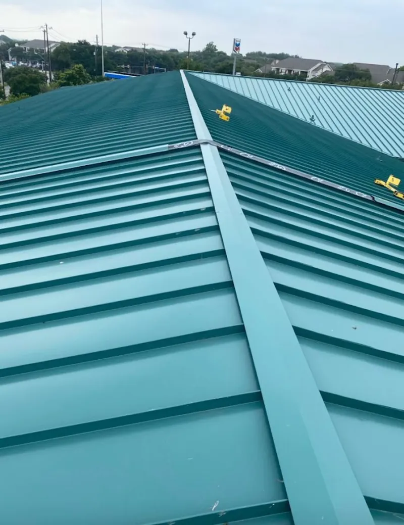 Green commercial metal roof ridge and valley for Metal Roof Repair in Ridgeland